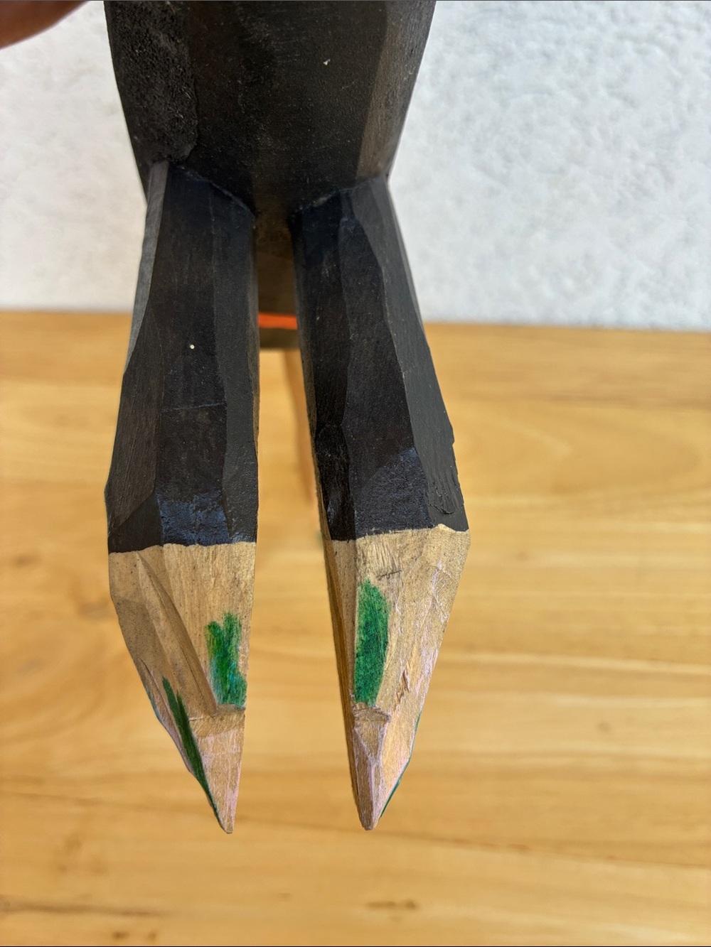 Strange hand carved folk art character with bland and orange clothes and a hook - Picture 6 of 13